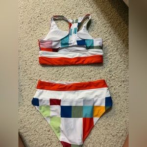 Swim suit - never worn.  Ordered wrong size and can’t return.  From gracesunny